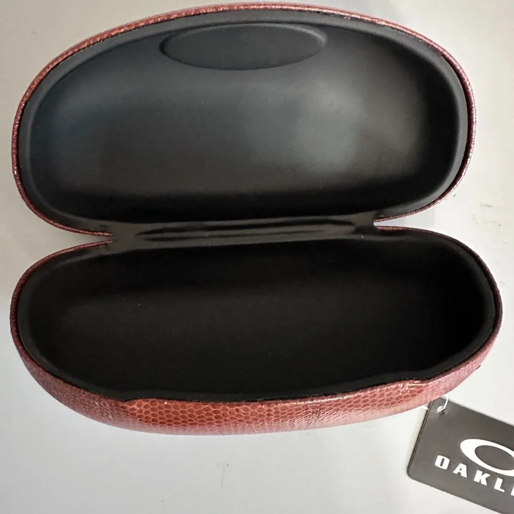 Oakley Dallas Cowboys NFL Football Sunglasses Hard Case Brown Textured Star Logo